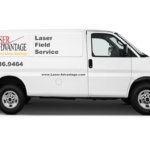 White van with Laser Advantage logo.