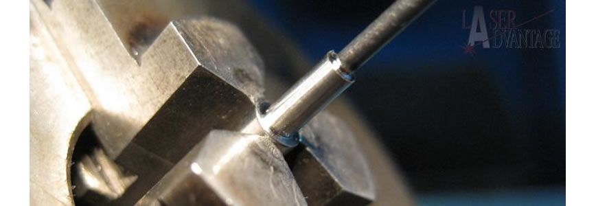 Close-up of a metal rod in a vice.