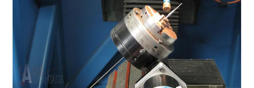 Close-up of a metal lathe with a chuck.