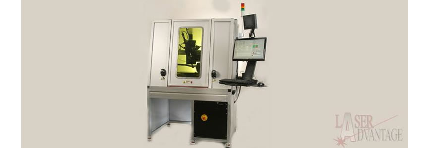 Industrial laser marking machine with computer.